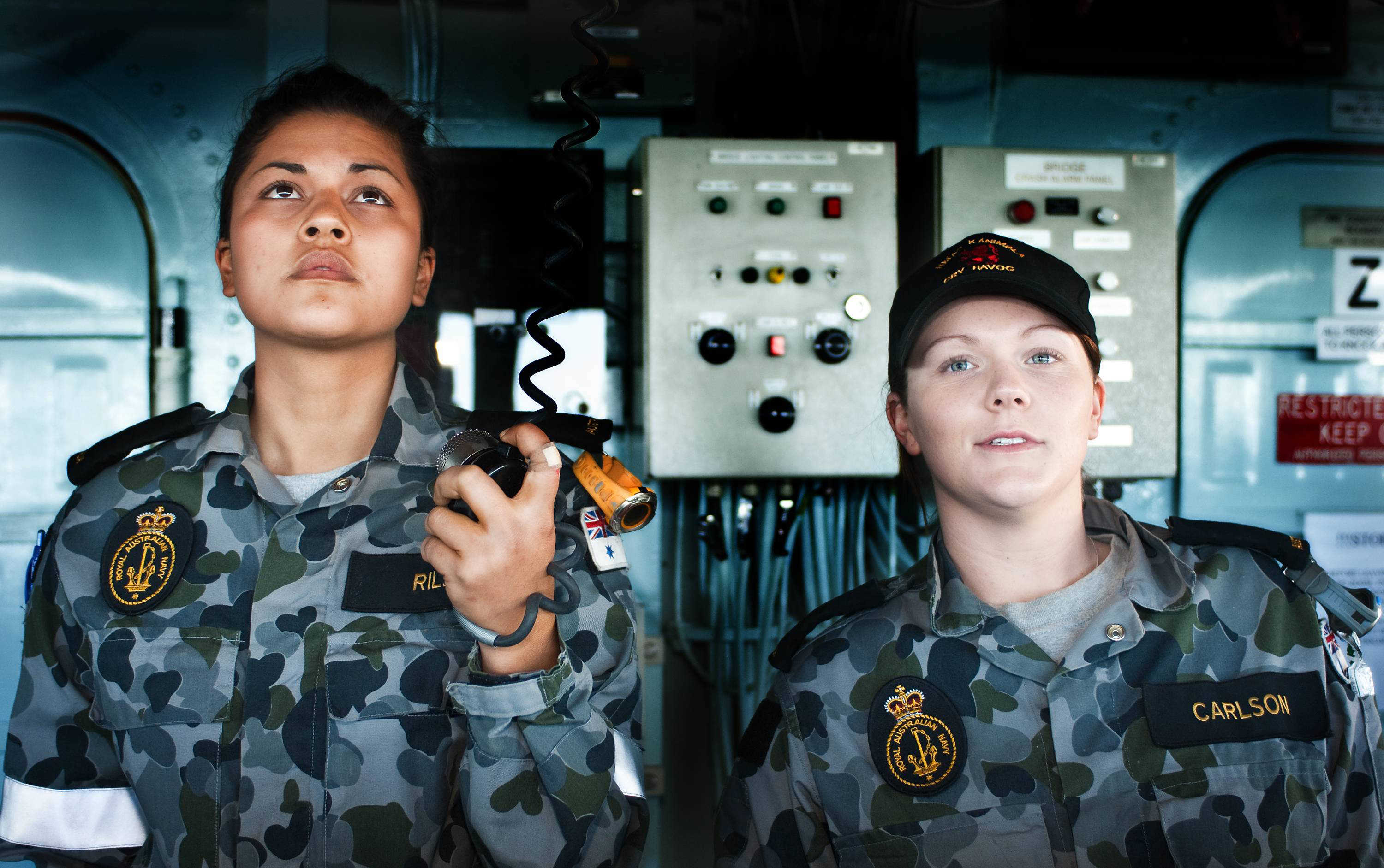 Seaman Boatswains Mate (SMNBM) Tara Riley (Left) takes the helm of HMAS ...