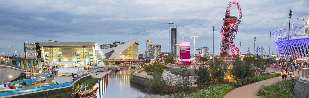 Photo of London's Olympic Park. Clients trust AECOM's planning and consulting services to map the path forward for new development and redevelopment of buildings, campuses, infrastructure, cities and regions.